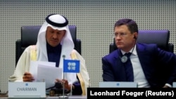 The energy ministers of Saudi Arabia and Russia at talks before the coronavirus pandemic.