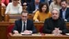 Varga Mihály pénzügyminiszter (b) szavaz Magyarország 2025. évi központi költségvetéséről szóló törvényjavaslatról az Országgyűlés plenáris ülésén 2024. december 20-án