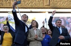 Maia Sandu, alături de prim-ministrul Dorin Recean și președintele Parlamentului Igor Grosu la evenimentul de lansare în campania pentru prezidențiale a lui Sandu, 20 septembrie 2024