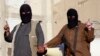 Бойцы группировки ИГИЛ на военном параде в захваченном ими сирийском городе Ракка