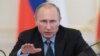 Владимир Путин во время встречи с членами правительства РФ в Ново-Огарево, июнь 2014
