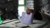 AFGHANISTAN -- An Afghan man casts his vote during the Parliamentary elections in Kandahar, Afghanistan, 27 October 2018.