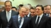 Президент Европейской Комиссии Жозе Мануэль Баррозу (справа), российский премьер-министр Владимир Путин и министр иностранных дел России Сергей Лавров прибыли на встречу в Брюссель, 24 февраля 2011