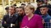 Emmanuel Macron și Angela Merkel discută cu angajații Airbus, 16 octombrie, 2019