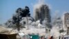 Palestinci bježe nakon što je zgrada pogođena izraelskim zračnim napadom u Gradu Gazi 5. septembra 2025. godine.